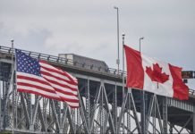 Canada-US vaccine mandates for truckers threaten worse supply chain disruptions